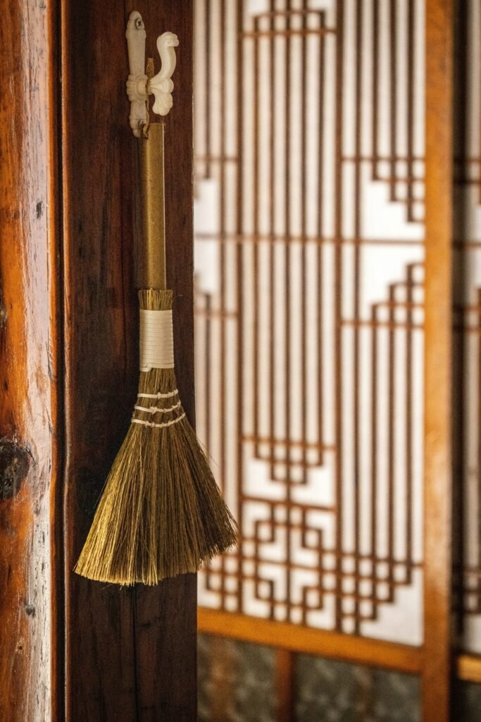 A traditional broom with natural fibers