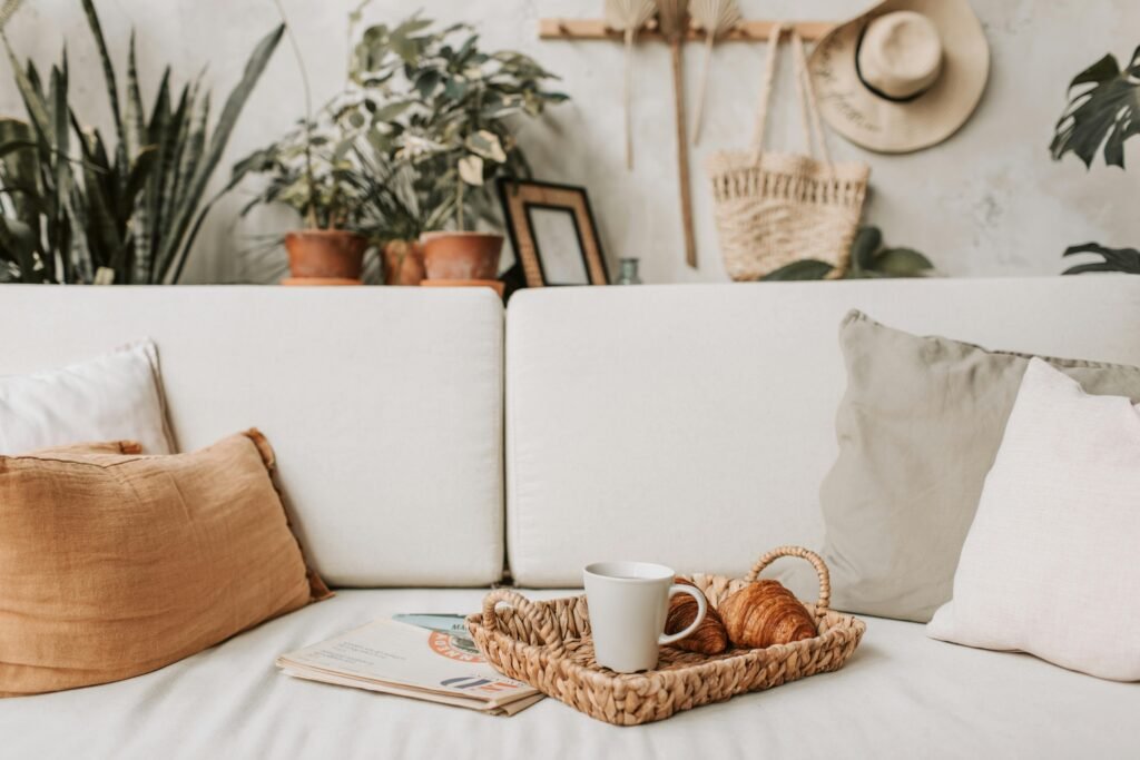 Cozy living room scene with coffee and croissants. Ideal for lifestyle and home decor concepts.